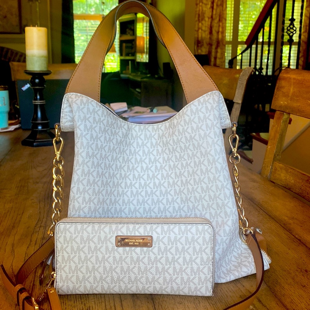 Michael Kors purse & wallet for sale. Excellent condition. Cream colored w/tan.